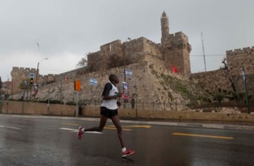 Running past the old city 370 (photo credit: Flash 90)