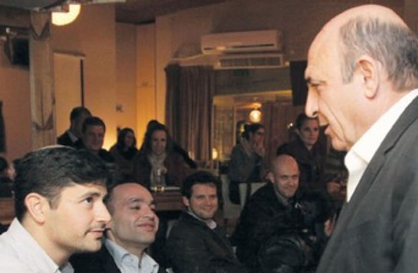 Mofaz shakes hands with supporters 370 (photo credit: Marc Israel Sellem/The Jerusalem Post)