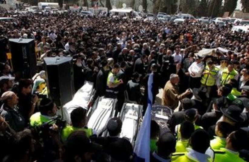 Mourners at funeral of Toulouse shooting victims 390 (R) (photo credit: REUTERS/Baz Ratner)