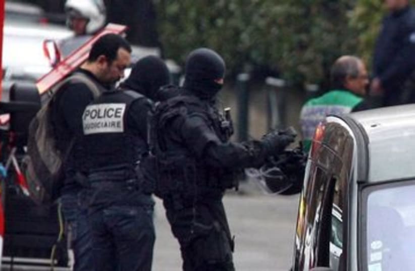 French police in raid on Toulouse shooting suspect 390 (R) (photo credit: REUTERS/Pascal Parrot)