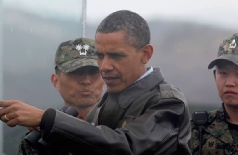 Obama at South Korea DMZ 370 (photo credit: REUTERS/Larry Downing)