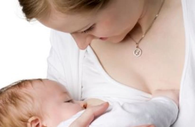 A woman breastfeeding 370 (photo credit: Thinkstock/Imagebank)