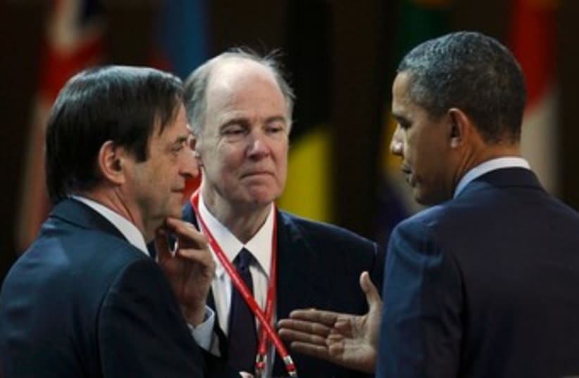 Dan Meridor speaks with US President Obama in Seoul 370 (R) (photo credit: REUTERS/Larry Downing)