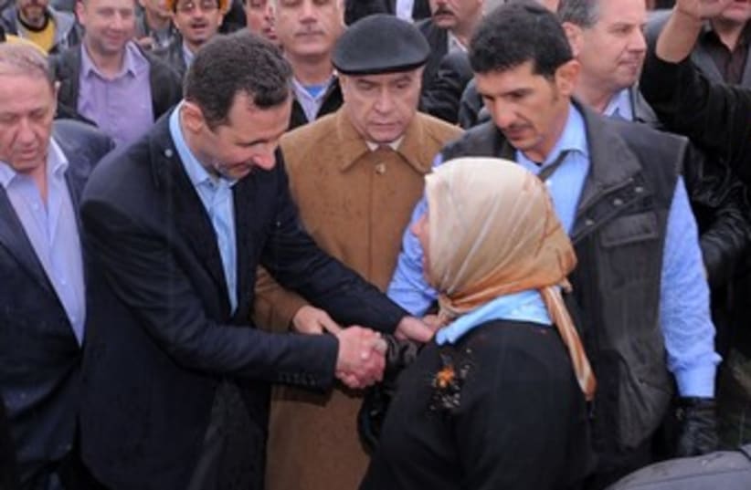 Assad visits Homs, Syria_370 (photo credit: Reuters)