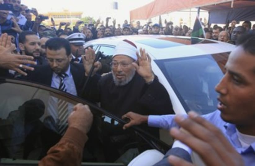 Yusuf Qaradawi arrives for Friday prayers_370 (photo credit: Esam Al-Fetori/Reuters)