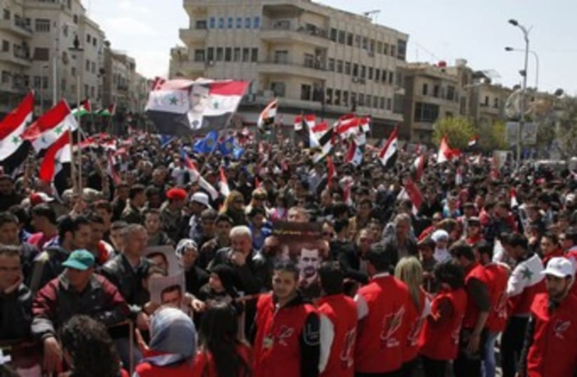 Land Day protest in Syria 370 (photo credit: REUTERS/Khaled al-Hariri )