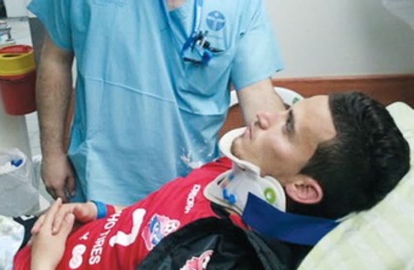 Ali Khatib at Rabin Medical Center after soccer brawl 370 (photo credit: Hapoel Haifa website)