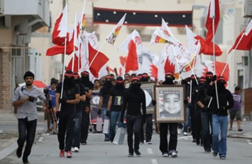 Anti-government demonstrators in Bahrain 370 (photo credit: REUTERS)