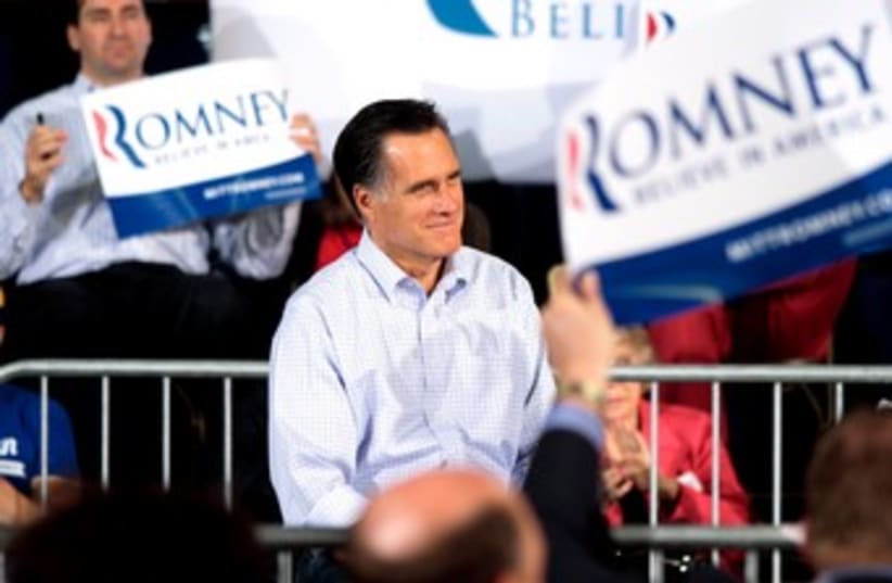 Republican Mitt Romney addresses supporters 370 (R) (photo credit: REUTERS/Darren Hauck)