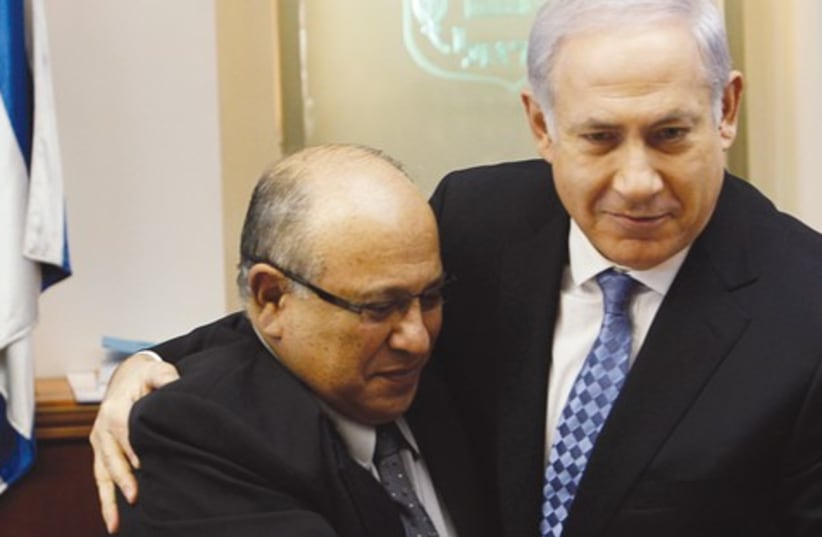 Netanyahu hugs Meir Dagan 521 (photo credit: REUTERS)