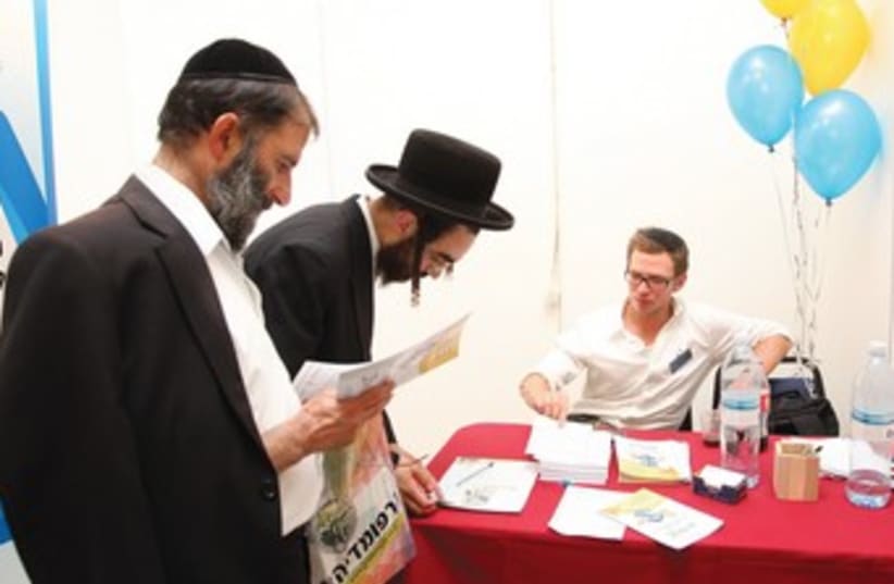 Haredi men attend a job far in J'lem 370 (photo credit: Marc Israel Sellem)