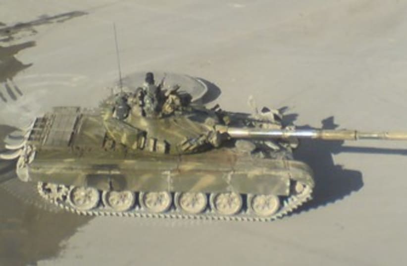 Syrian army tank is seen in Yabroud near Damascus 370 (photo credit: reuters)