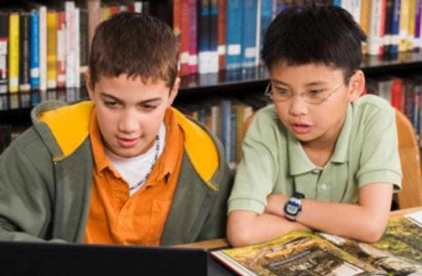 Children studying in a library 370 (photo credit: Thinkstock/Imagebank)