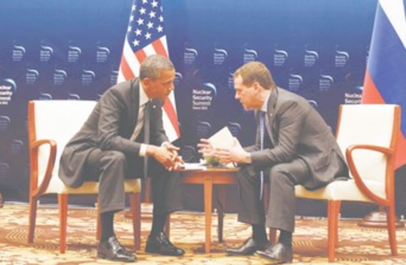 Obama, Medvedev missile defense talk 370 (photo credit: REUTERS)