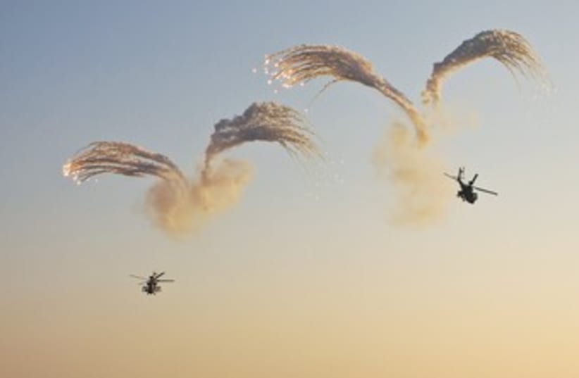 APACHE HELICOPTERS in the South 370 (photo credit: Nir Elias/Reuters)