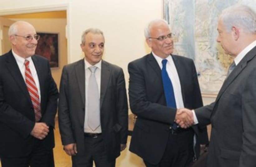 Netanyahu greets Palestinian delegation 370 (photo credit: Amos Ben-Gershom/GPO)