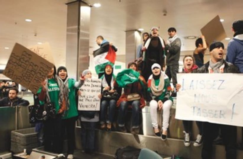 pro-Palestinian activists at Brussels airport 370 (photo credit: Reuters)