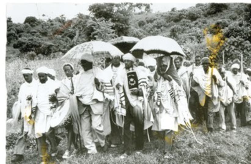 Jews in an Ethiopian village in procession to synagogue (photo credit: Don Robinson)