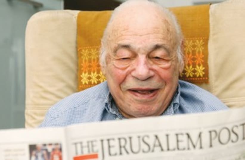 Marlin Levin reads 'The Jerusalem Post' 370 (photo credit: Marc Israel Sellem)