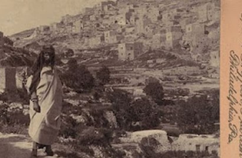 Yemenite Jew near old city walls (photo credit: American Colony-Jerusalem-Photo Dept.)