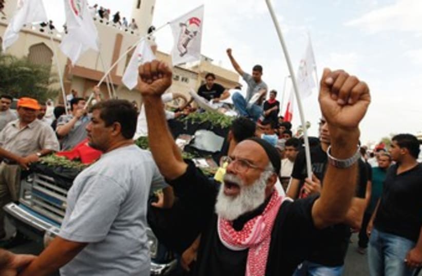 protestors in Bahrain after Grand Prix death_370 (photo credit: Reuters)