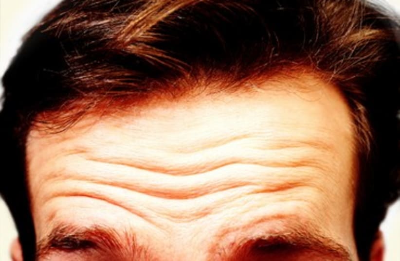 Wrinkles on forehead (photo credit: Thinkstock/Imagebank)