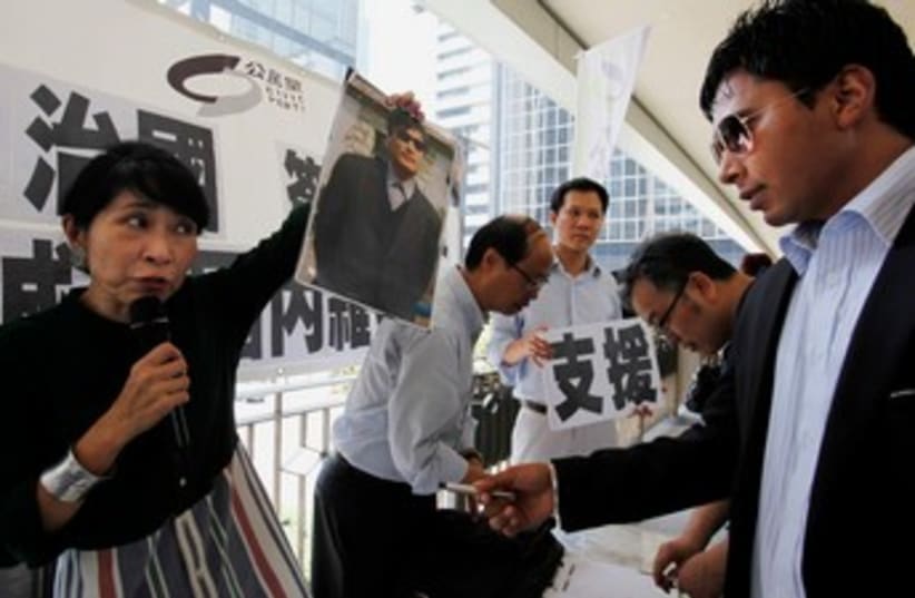 Chinese Dissident Chen (photo credit: REUTERS/Bobby Yip)