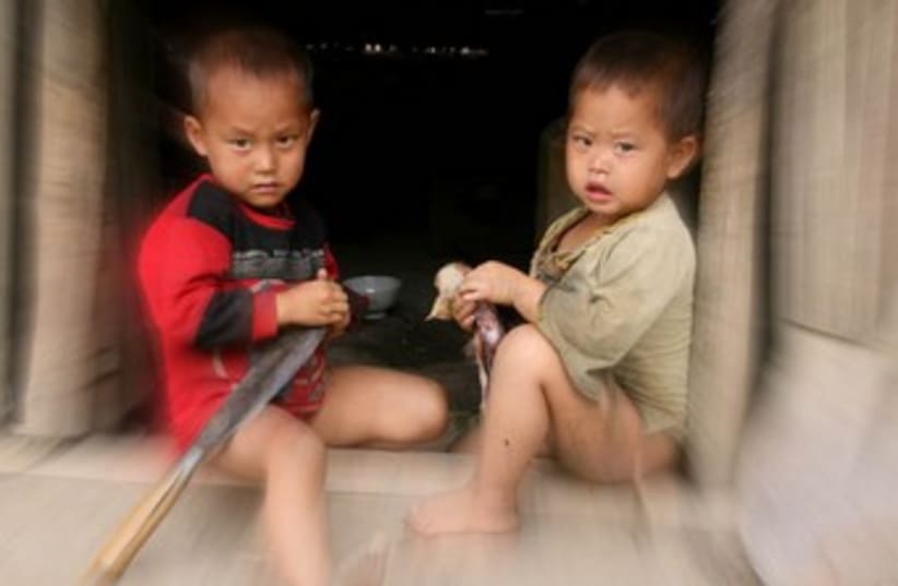 Blurred picture of two children (photo credit: Mike Mayer)