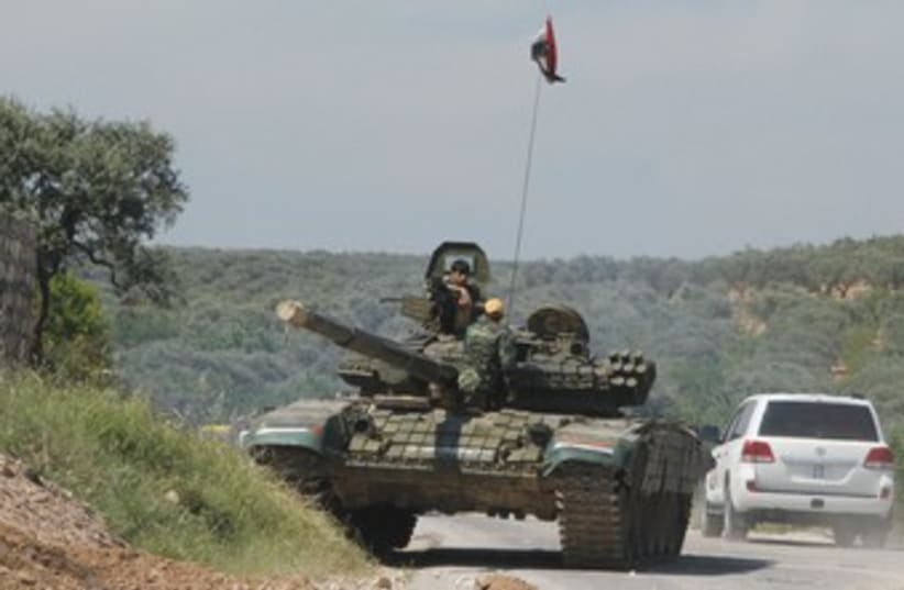 Syrian tank (photo credit: Reuters)