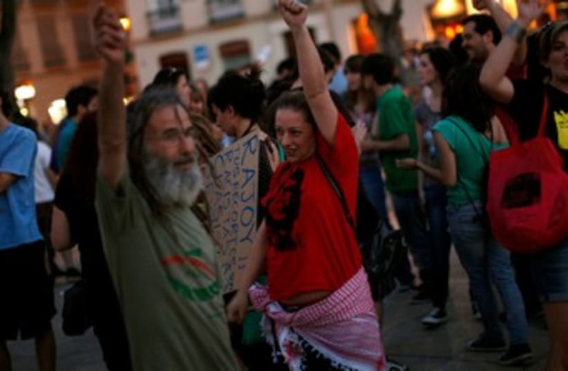 1-year anniversary of Spain's "Indignados" movement 370 R (photo credit: REUTERS)