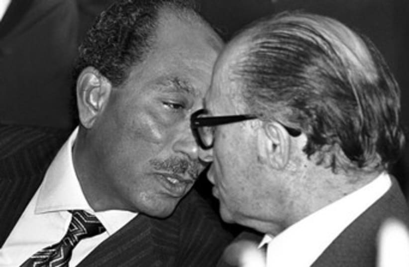 Sadat and Begin (photo credit: REUTERS)