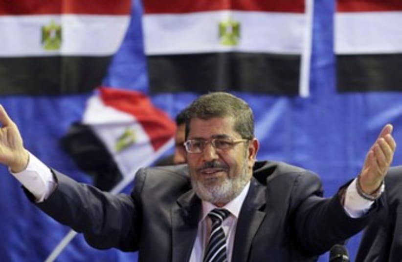 Muslim Brotherhood presidential candidate Mohamed Mursi 370 (photo credit: REUTERS/Mohamed Abd El Ghany)