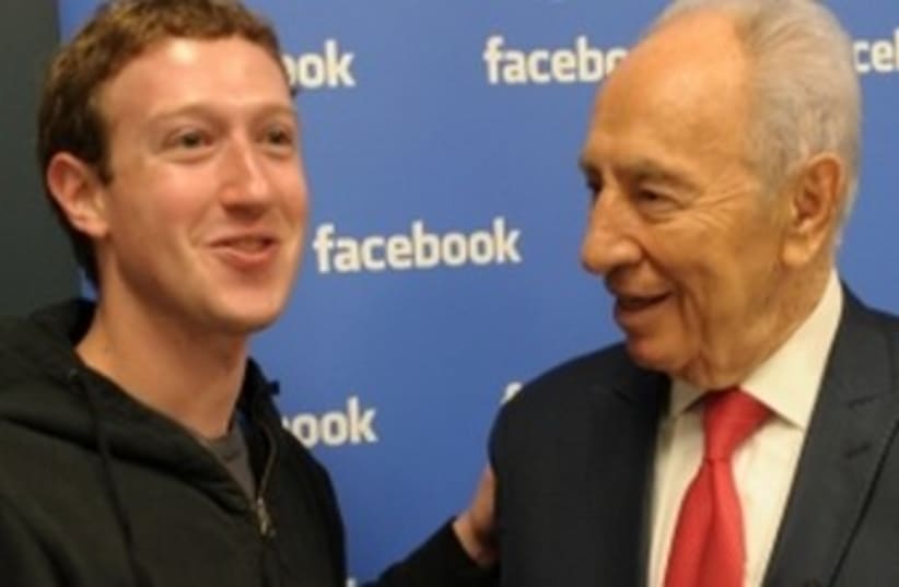Mark Zuckerberg, Shimon Peres (photo credit: Moshe Milner/GPO/FLASH90)