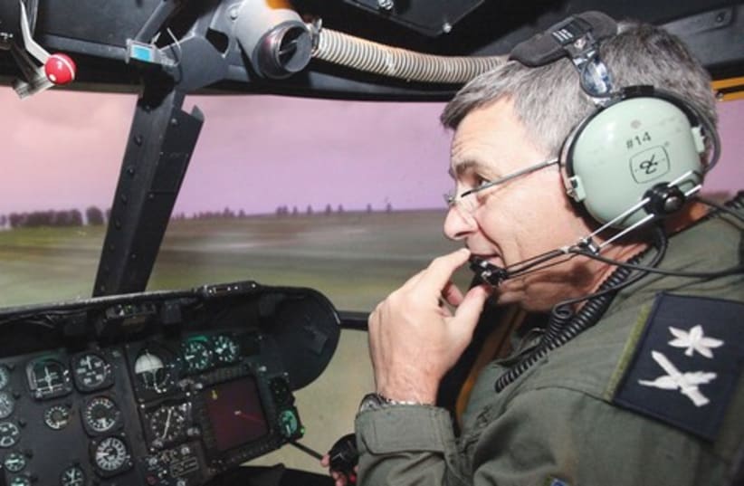 Ido Nehushtan in the cockpit of a Cobra attack helicopter  (photo credit: Marc Israel Sellem)