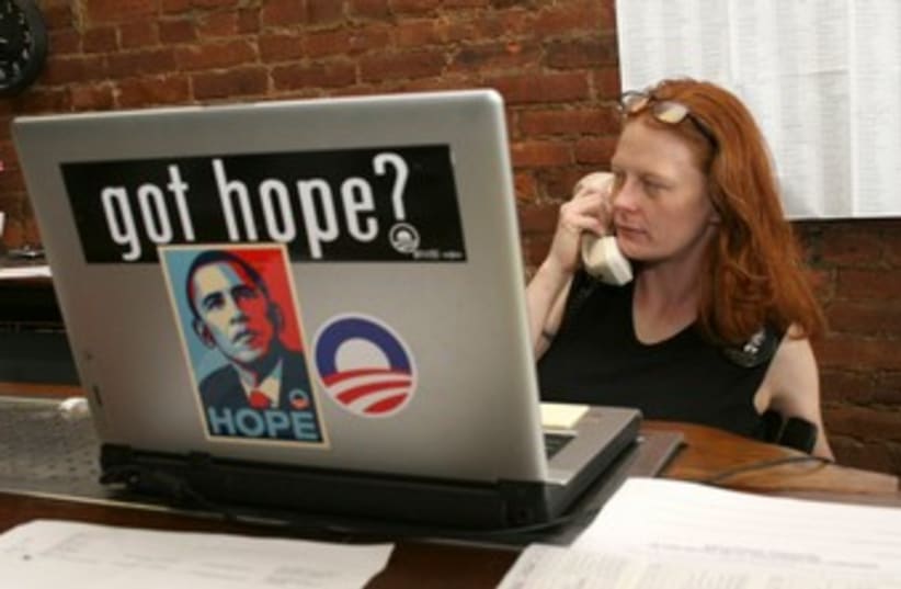 Obama campaign volunteer 370 (R) (photo credit: REUTERS/Frankie Steele)