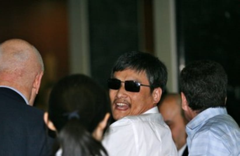Blind Chinese activist Chen Guangcheng 370 (photo credit: REUTERS)