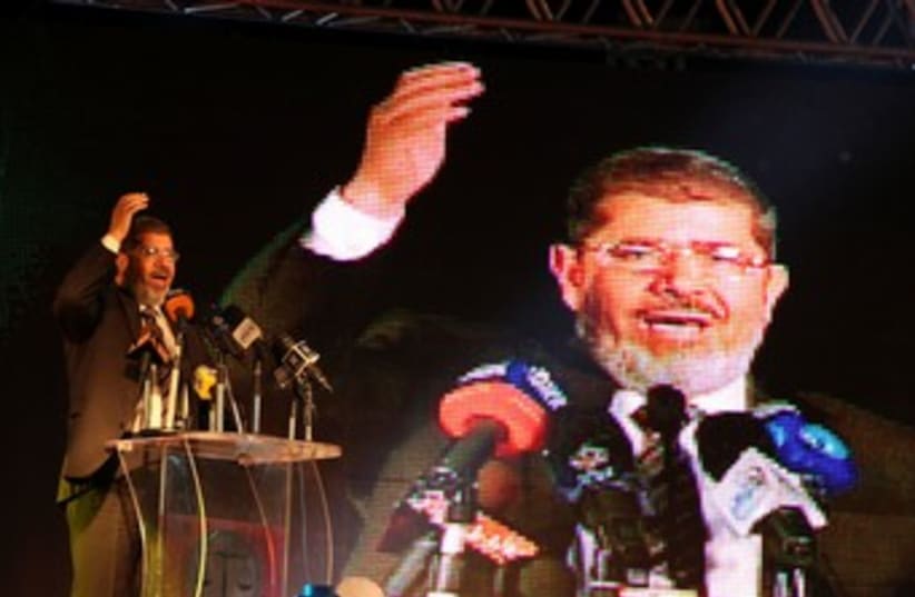 Muslim Brotherhood presidential candidate Mohamed Mursi 370  (photo credit: REUTERS/Mohamed Abd El Ghany)
