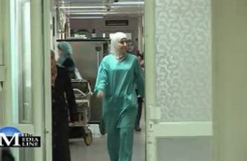 Woman doctor in Palestinian Al-Makassed Hospital 311 (photo credit: The Media Line)