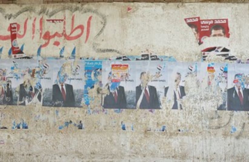 Defaced posters in Egyptian elections 390 (photo credit: Eliezer Sherman)