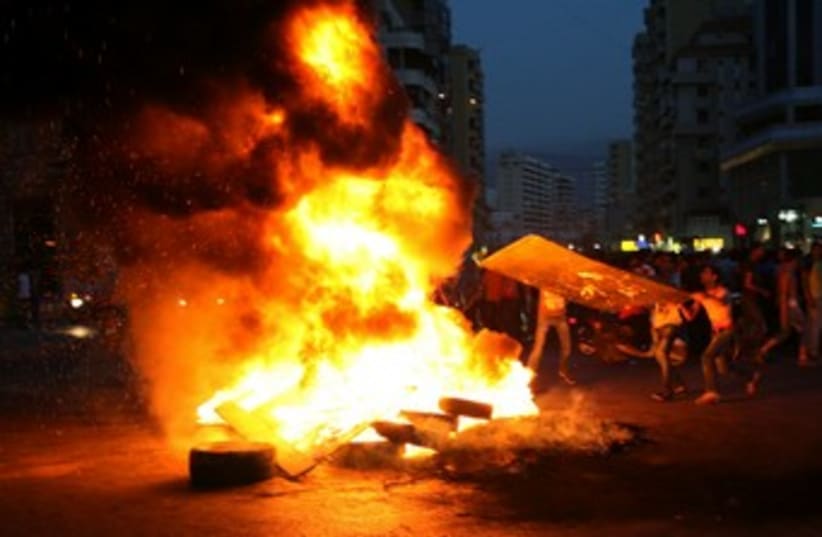 Lebanese Shi'ites protest  370 (photo credit: REUTERS)