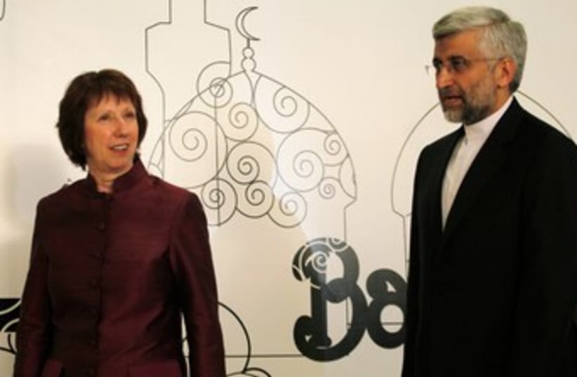 Catherine Ashton, Iranian negotiator Saeed Jalili 370 (R) (photo credit: REUTERS/Thaier al-Sudani)