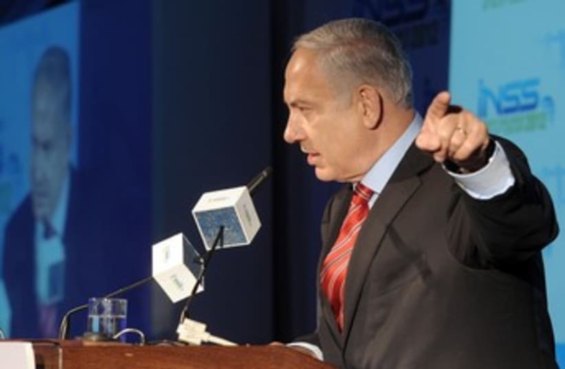 PM Netanyahu at INSS_370 (photo credit: GPO)