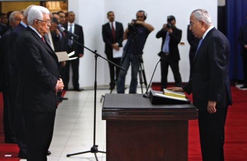 Salam Fayyad Mahmoud Abbas 521 (photo credit: Reuters)