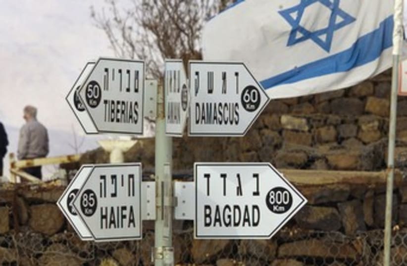 Signposts atop the Golan Heights 370 (photo credit: Reuters)