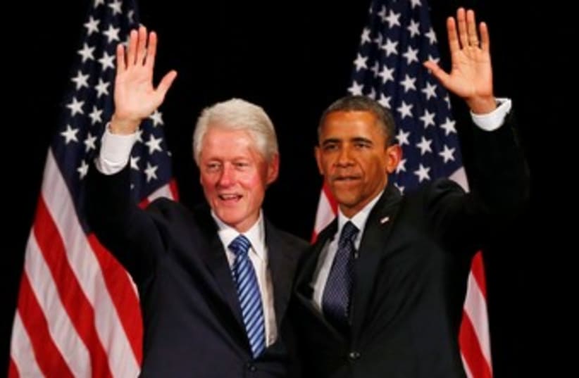 Bill Clinton and US President Barack Obama at fundraiser 370 (photo credit: REUTERS)