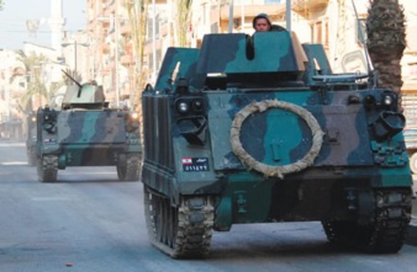 Tanks on the streets of Tripoli in Lebanon 370 (photo credit: Reuters)
