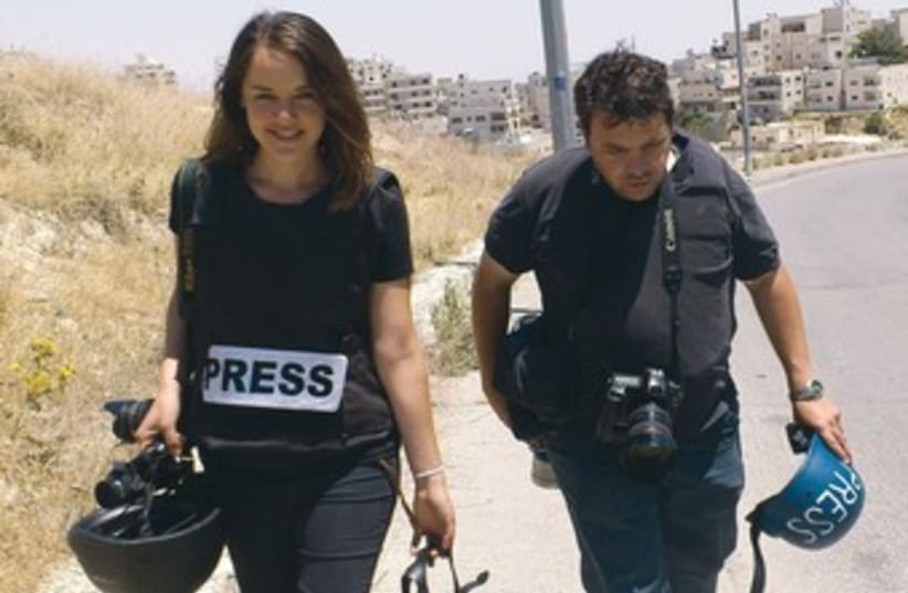Photographer Marc Sellem, video journalist Hadas Parush  (photo credit: Melanie Lidman)