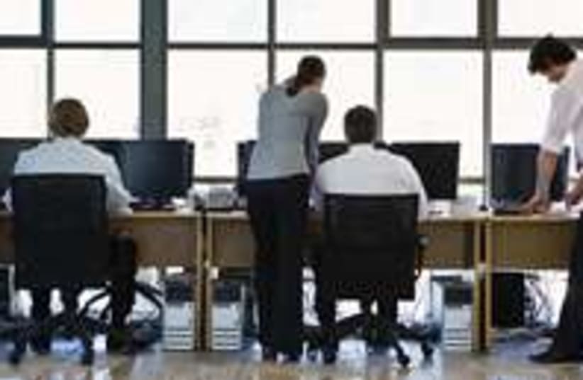Workers in an office 300 (photo credit: Thinkstock)