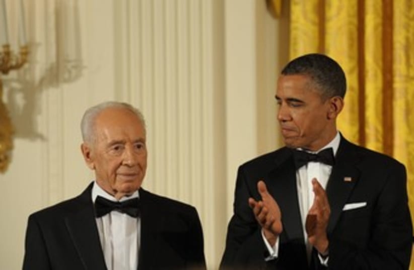 Peres and Obama 370 (photo credit: Amos Ben Gershom / GPO)