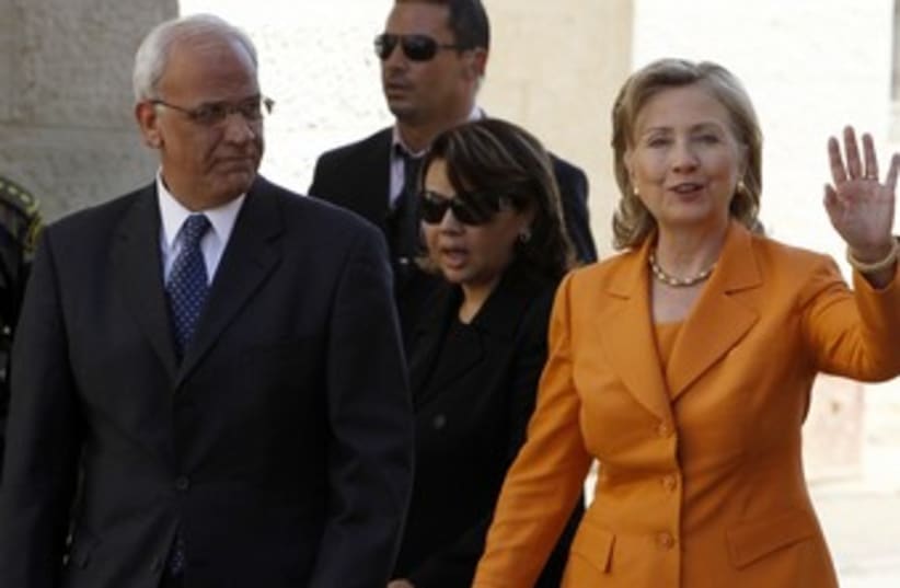 Hillary Clinton and Saeb Erekat meet in Ramallah [file] 370R (photo credit: Ammar Awad / Reuters)